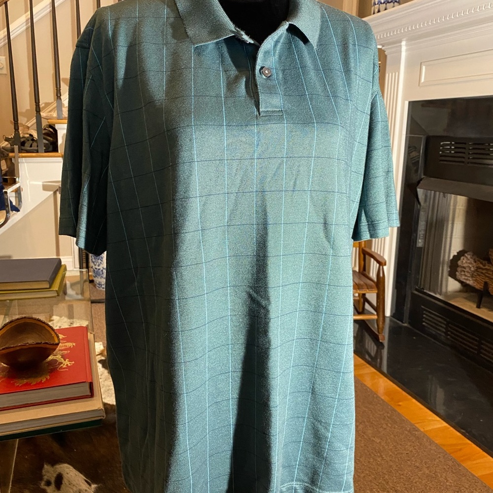 Van Heusen green with small black and light blue accents.  Size XXL